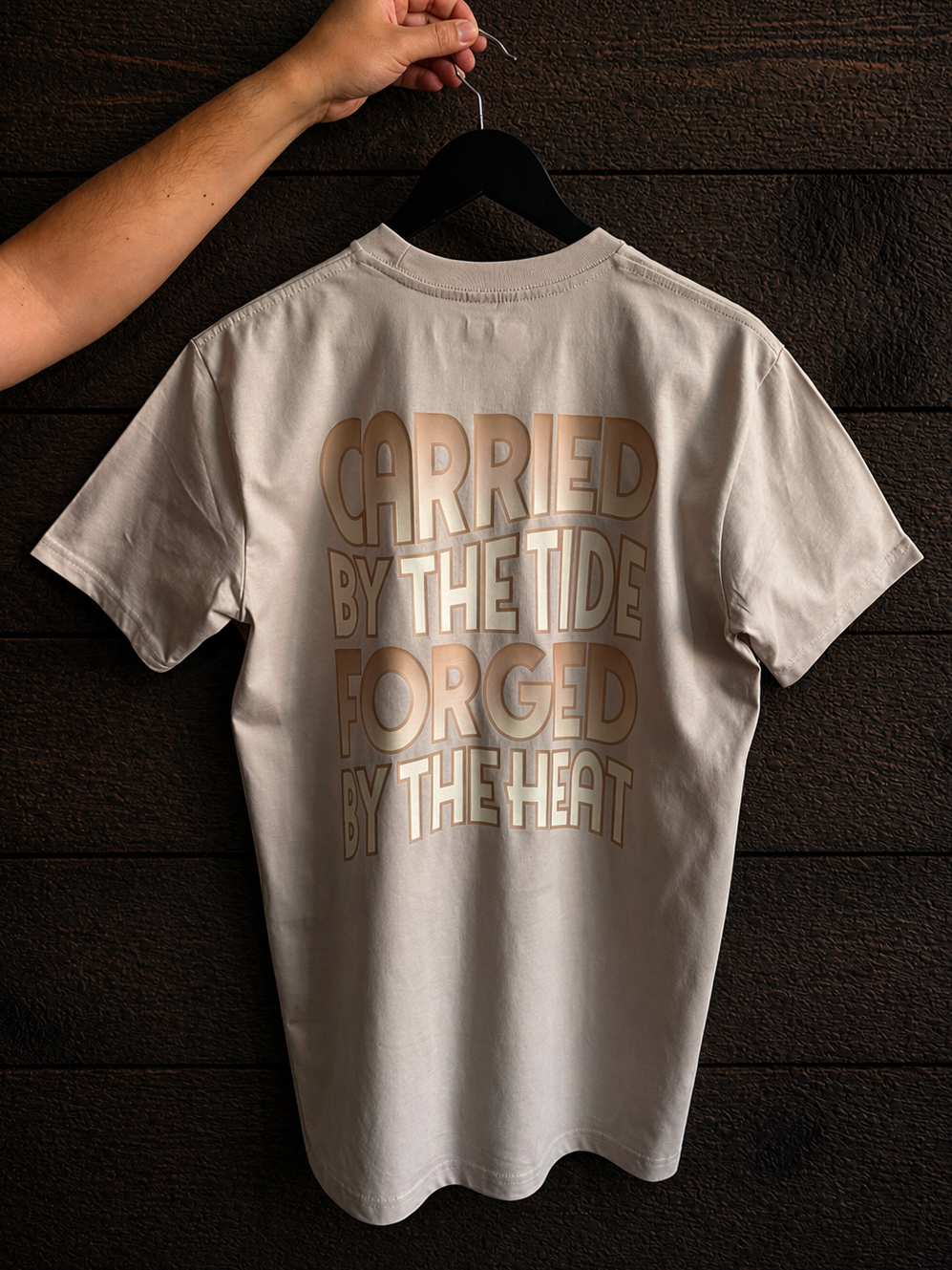 Product shot of the back print of the Carried by the Tide Classic Tee in Bone.