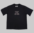 Front of the Motto Box Tee in Black with semi-tonal text