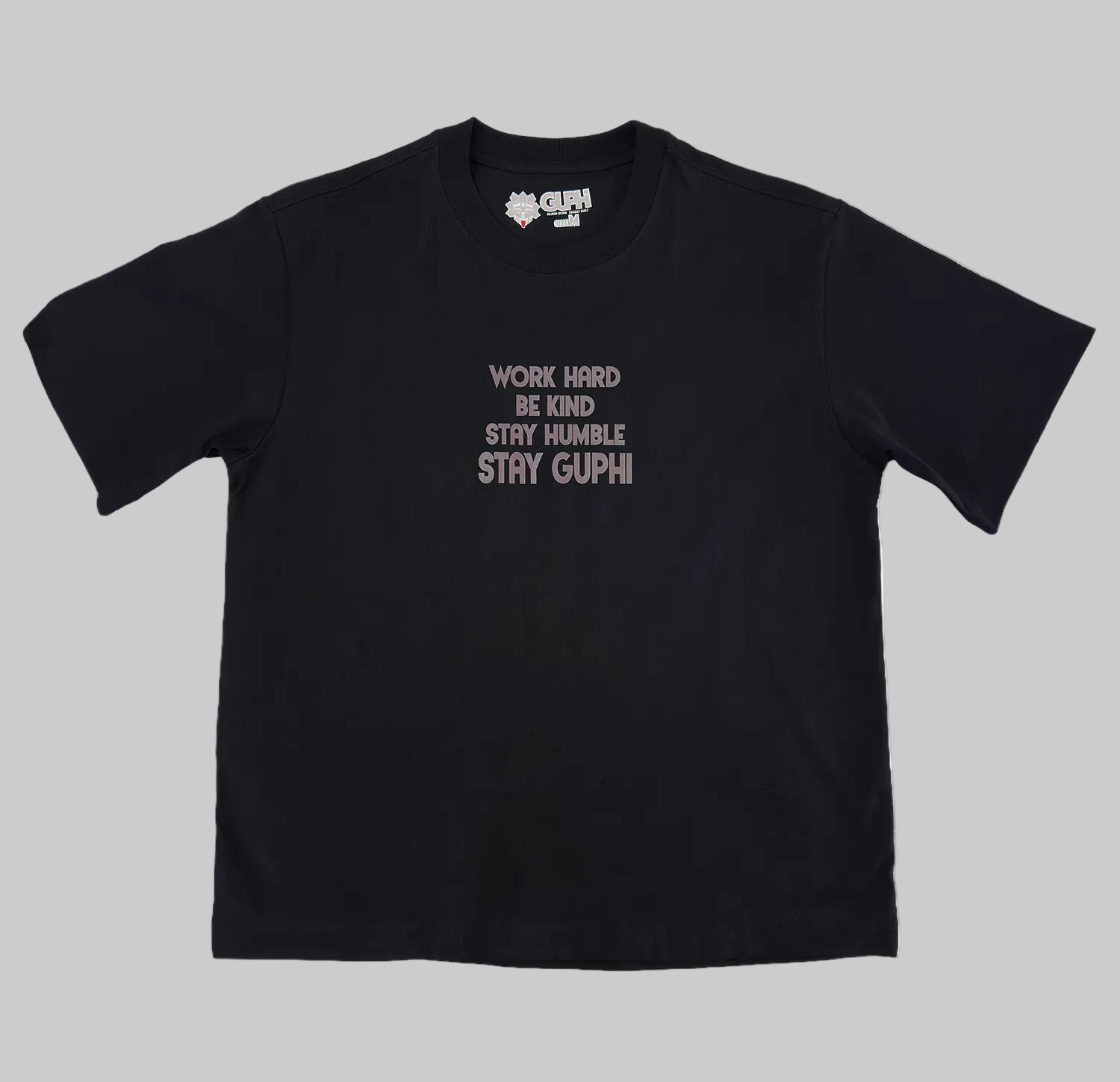 Front of the Motto Box Tee in Black with semi-tonal text