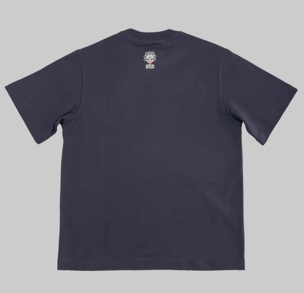 Back of the Motto Box Tee in Ink Blue with a small GUPHI logo on the center of the neckline